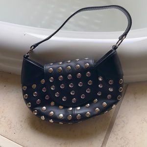 Cute studded leather bag.